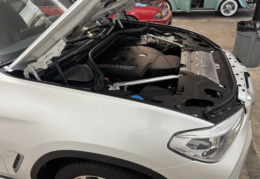 Clean engine bay of a white BMW X3