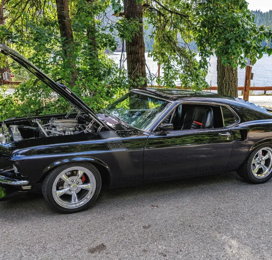 Black Ford Mustang Boss 351 with the hood up