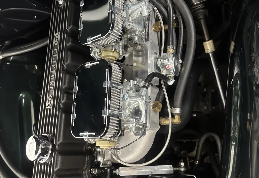 Detailed inline six engine bay with Clifford valve cover