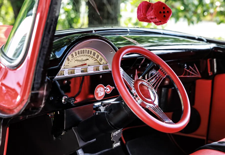 Red and black interior of a restored Ford F-100